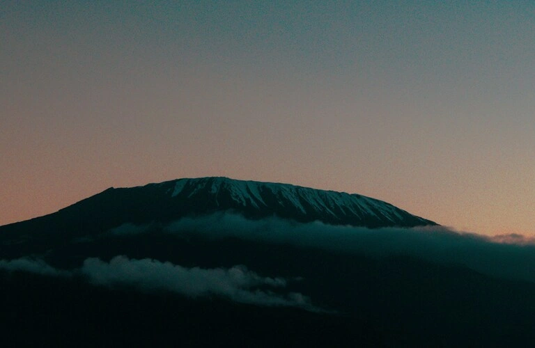 Explore the 5-day Marangu Route cost and package details, hut stays, and expected tips for a smooth and successful climb.